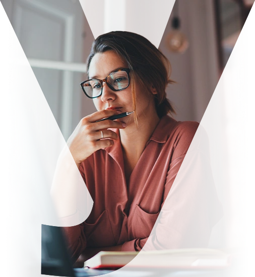 Businesswoman working on a laptop at home
