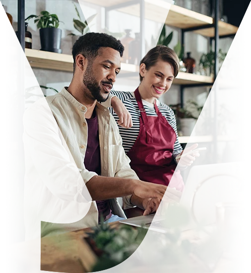 Small business owners working together on a laptop