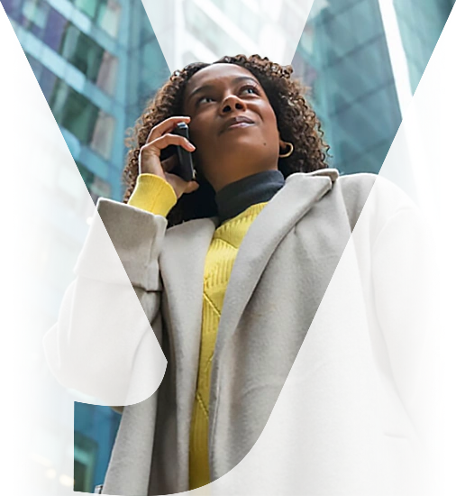 Business professional making a mobile call in a city
